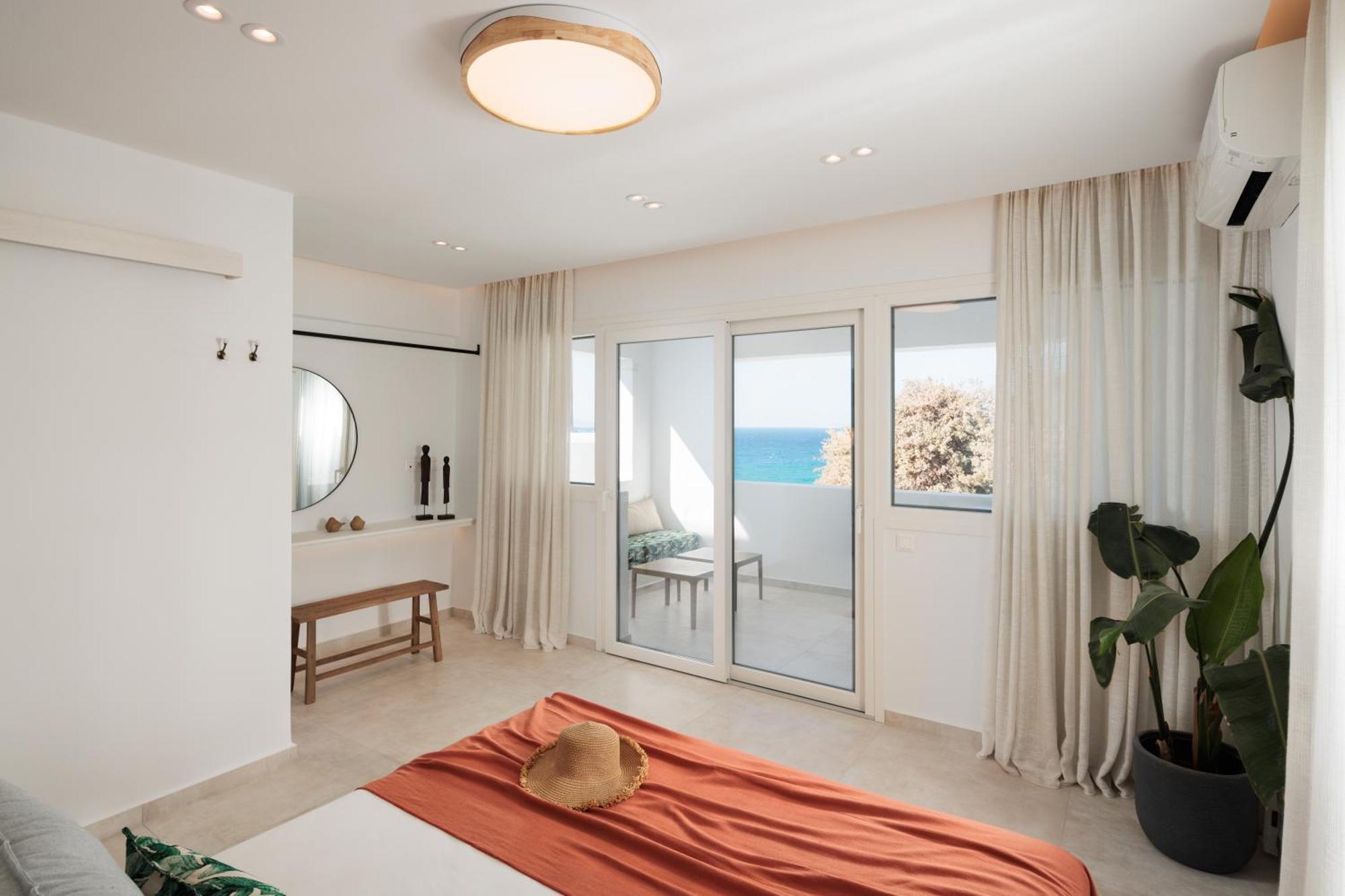 Seanfinity Beachfront Suites Mikri Vigla Quarto foto
